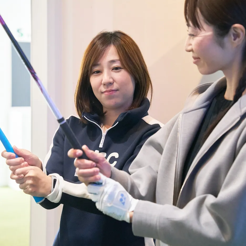 女性コーチと生徒